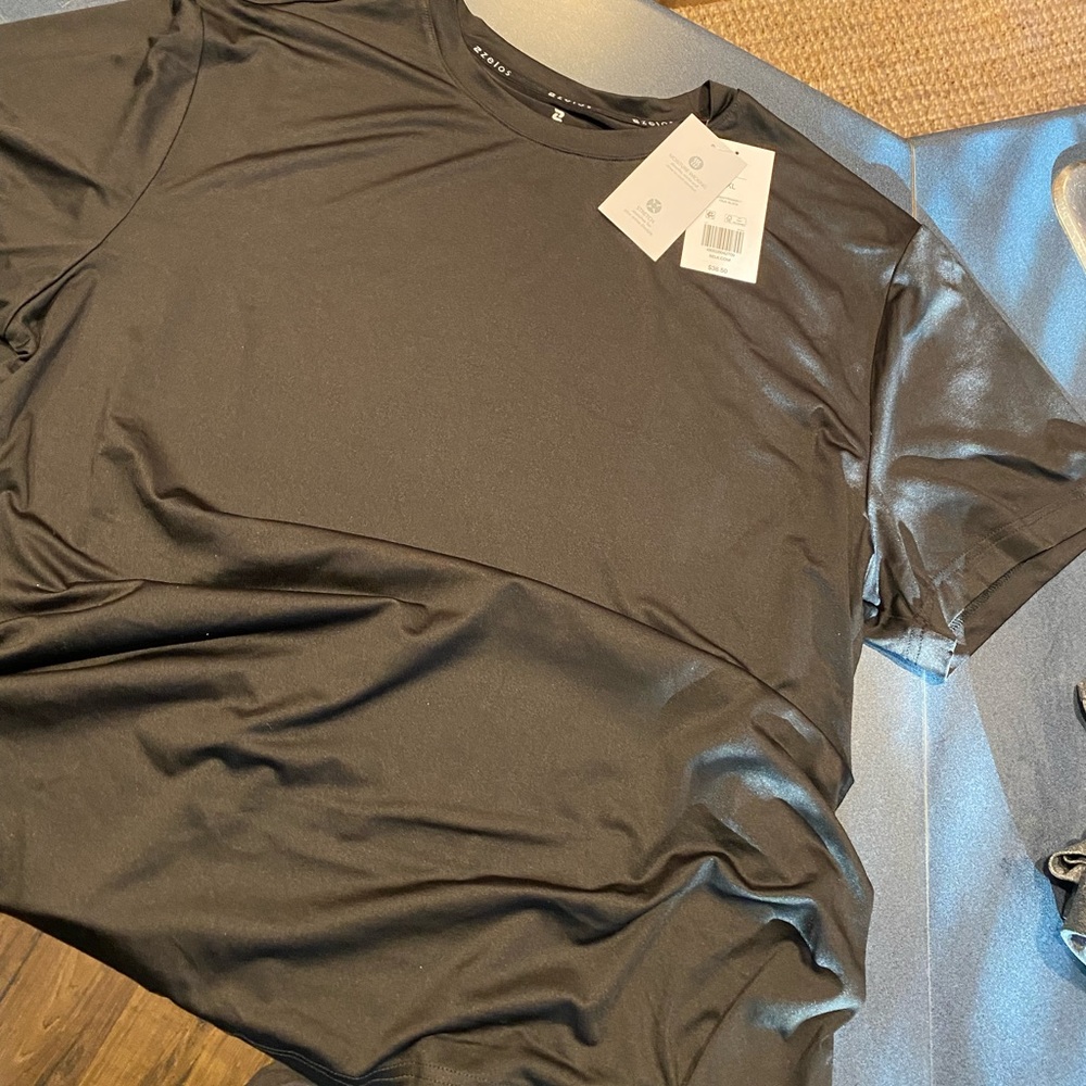 Men’s Zelos Dri Wick short sleeve shirt. Brand new with tags.